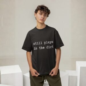 "Unisex" Still Plays In The Dirt - Funny, Drop Shoulder Tee